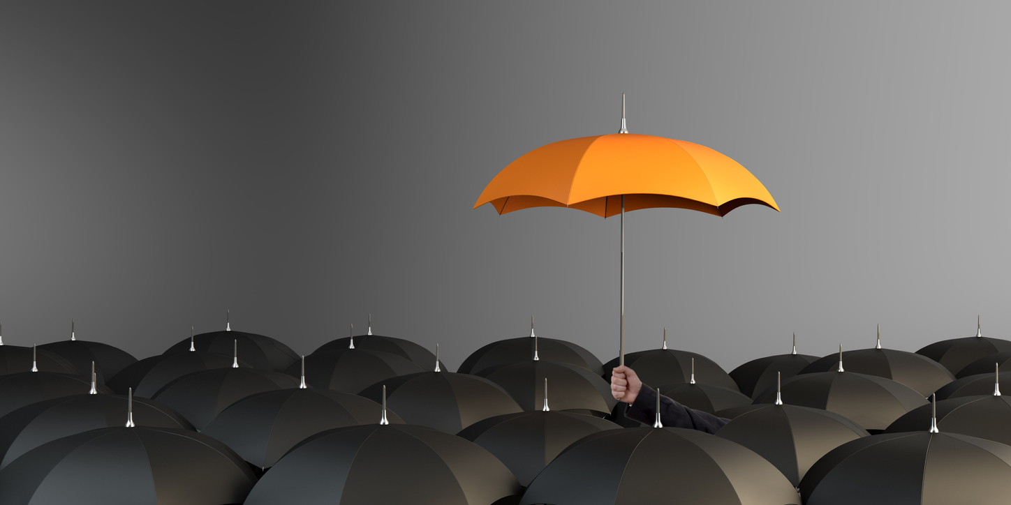 Orange Colored Umbrella Between The Black Umbrellas – Calculator